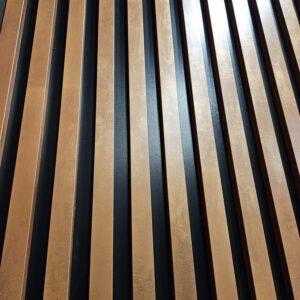 Decorative Wall Lamella Panels on a Base, Copper on a Black