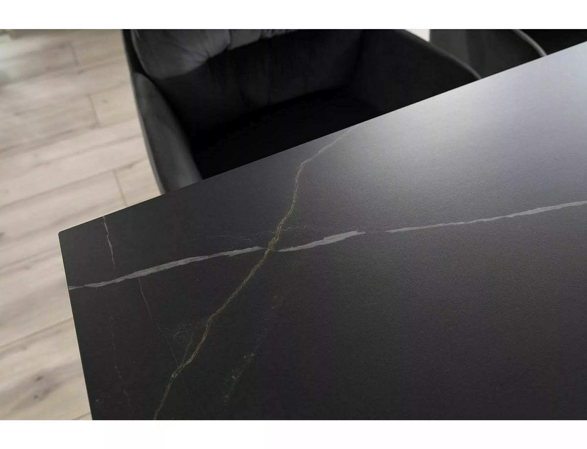 Sahara Noir black ceramic tabletop with elegant grey marble effect veining