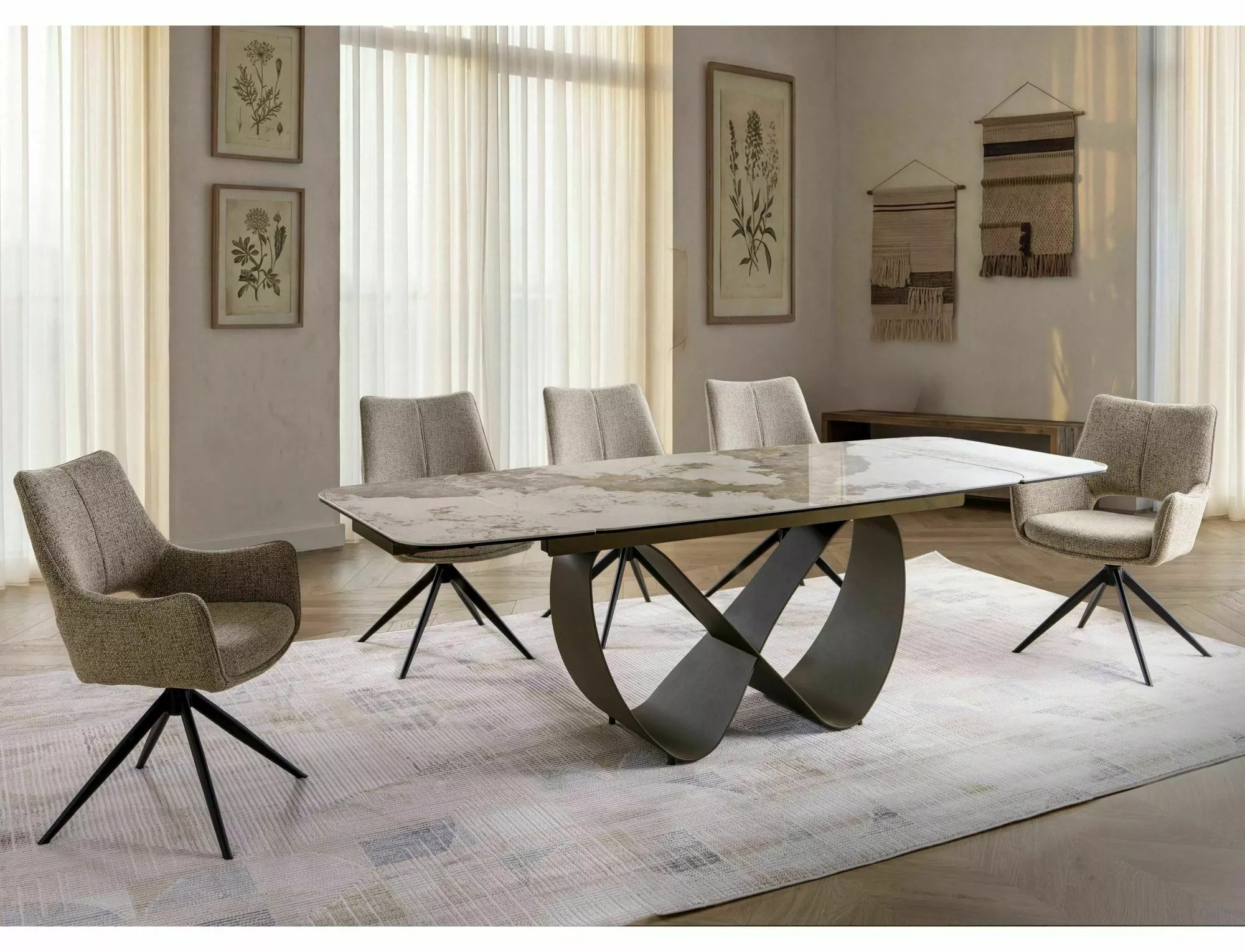 Infinity Pandoro ceramic dining table with neutral upholstered chairs in contemporary dining room