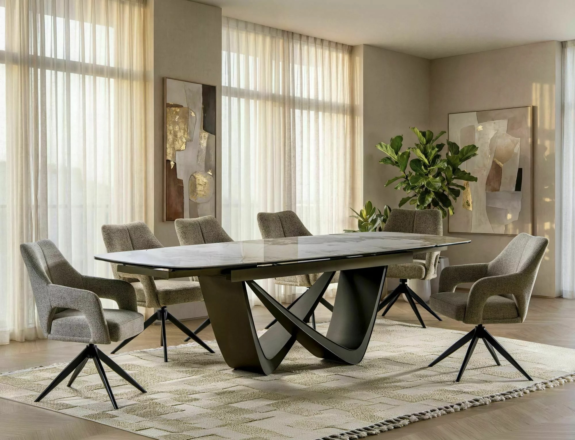 Maranello ceramic extending dining table with beige upholstered chairs in elegant modern dining room