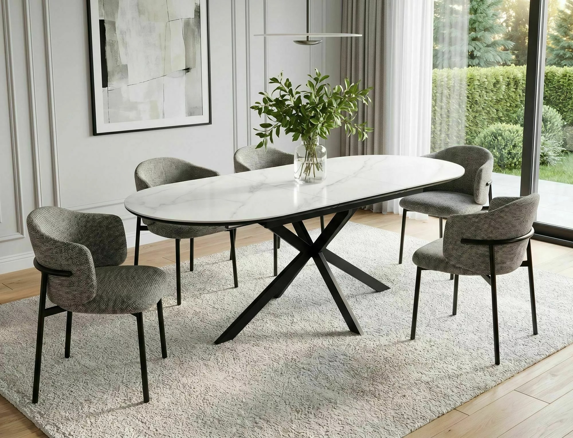 White oval ceramic extending dining table styled in a contemporary dining room
